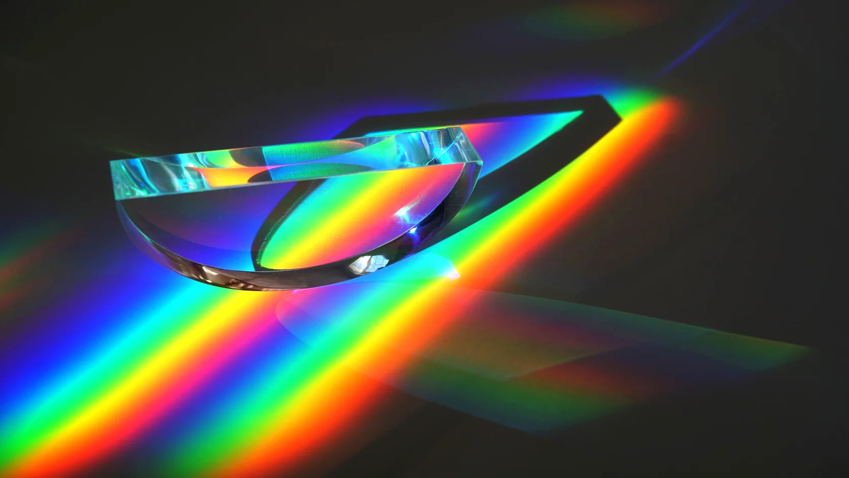 Light refracted through a prism, expressing research, analysis, and perspective.